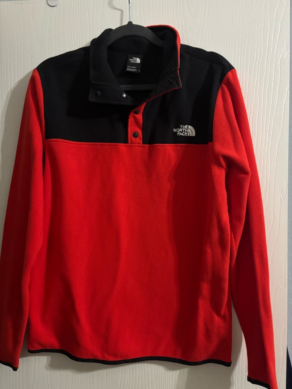 The North Face Red and Black Snap-Front Fleece Pullover
Men’s size Medium